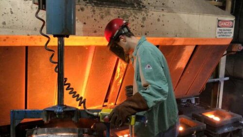 File Photo: A Worker Pours Hot Metal At The Kirsh Foundry In Beaver Dam